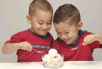 Boys eating ice cream copyright Hugh Stonelan iStockPhoto 000002098108